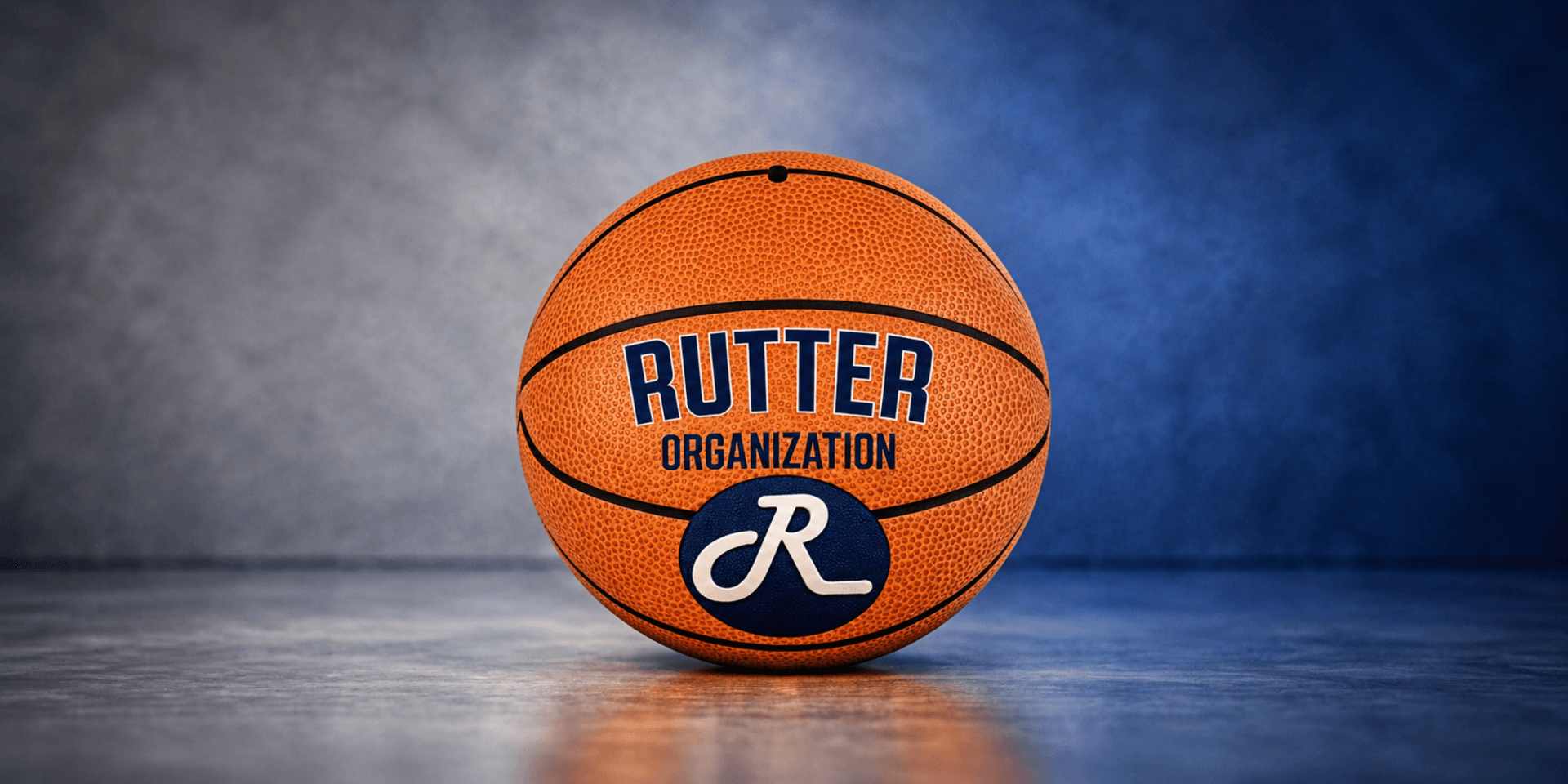 A basketball featuring the name "Rutter Organization" and a stylized "R" logo